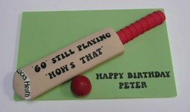 Cricket bat and ball cake